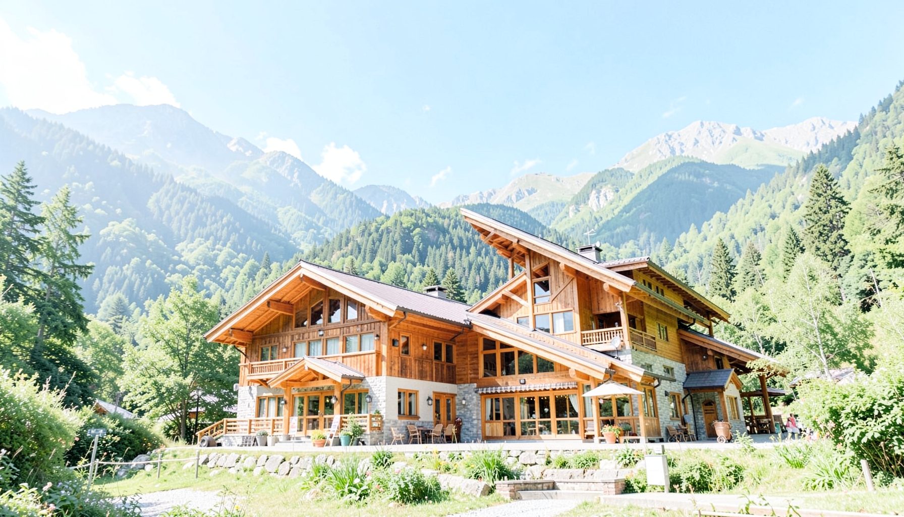 A mountain resort lodge with warm timber architecture, surrounded by lush green hills under a bright blue sky